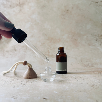 elena london car diffuser refill oil being applied