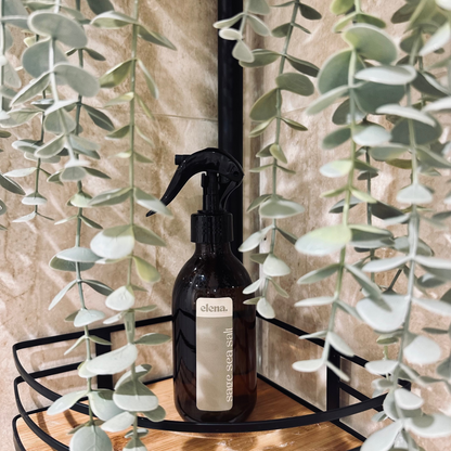 elena london sage sea salt room spray styled in a calm bathroom setting